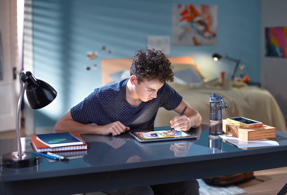 Man working on computer at desk