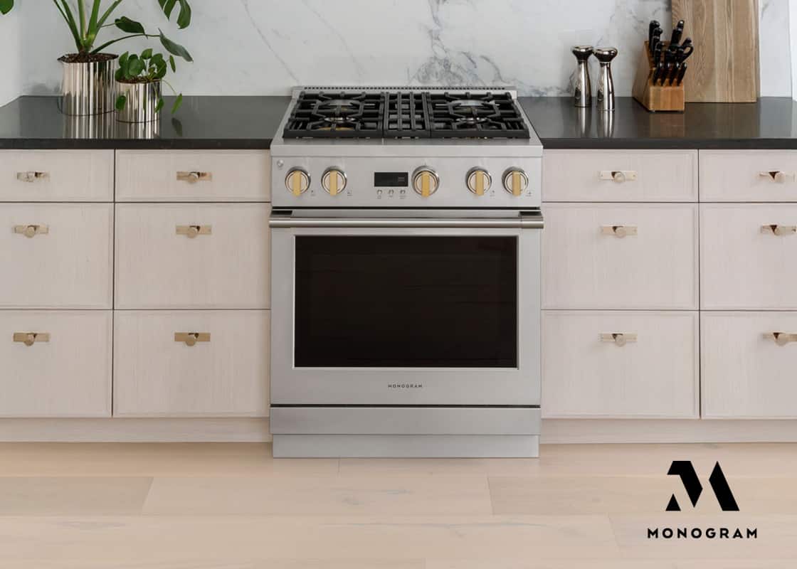 Monogram range in kitchen.
