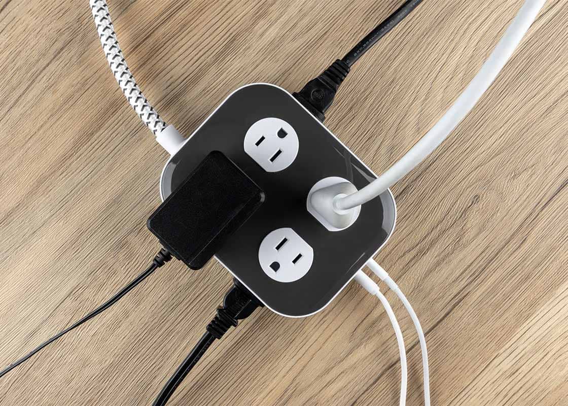 Philips surge protector on wood.
