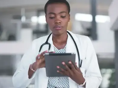 Doctor with tablet