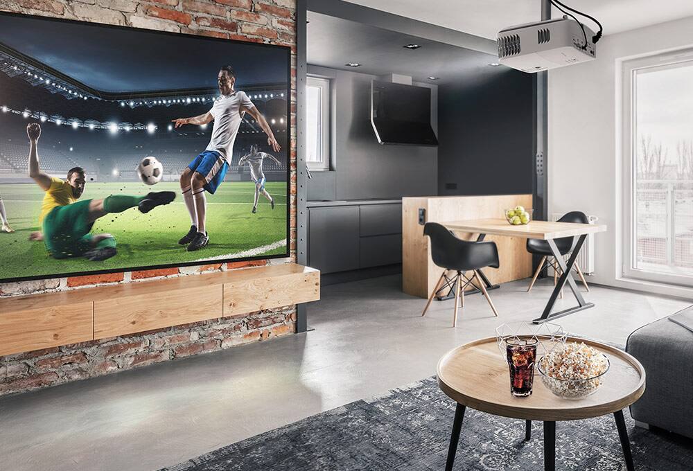 A projector showing soccer game