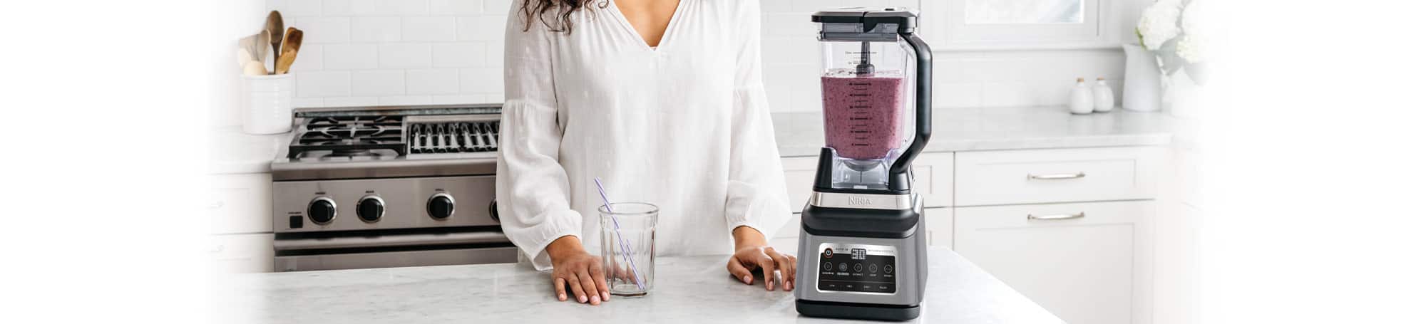 Person using blender