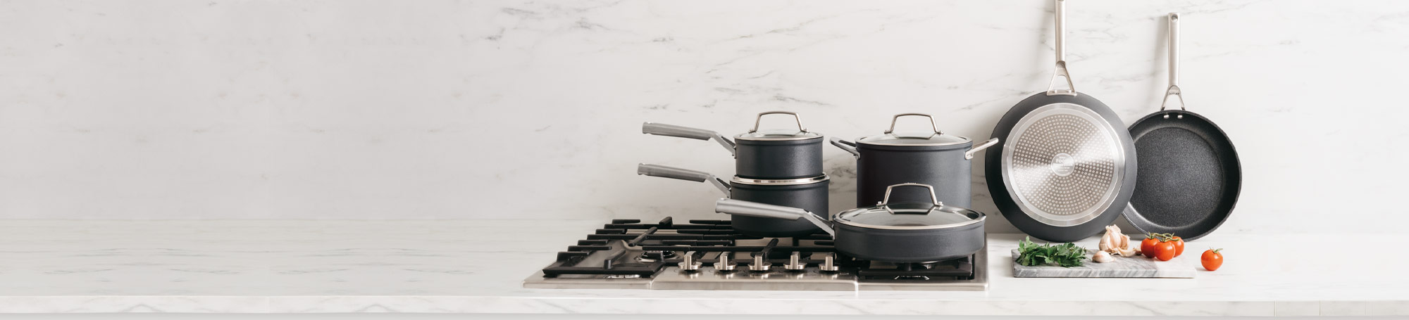 Gray cookware on stovetop and countertop