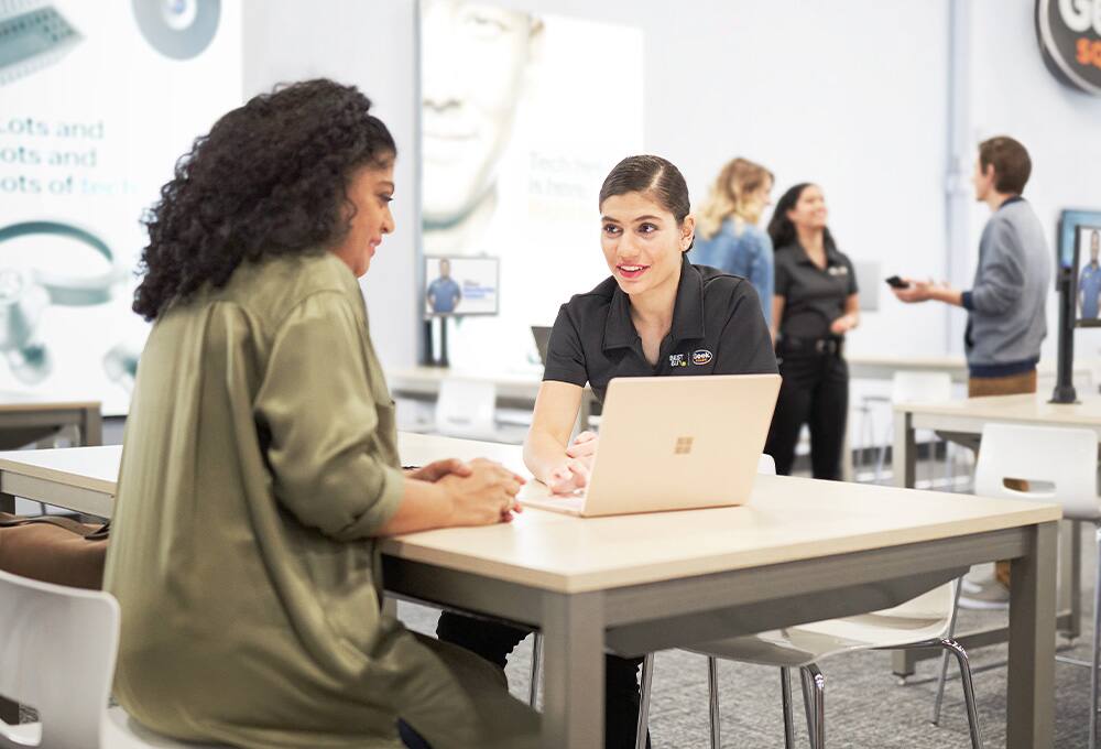 Geek Squad Agent with customer.