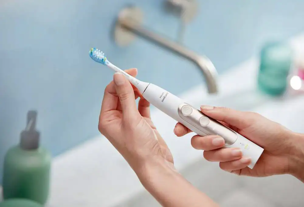 Power flosser/toothbrush system