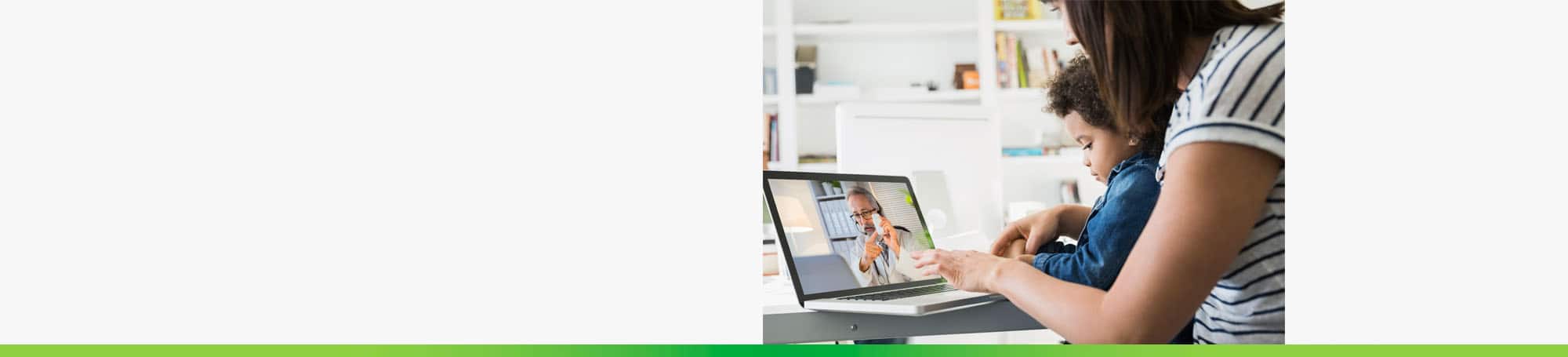 Mother and daughter with laptop