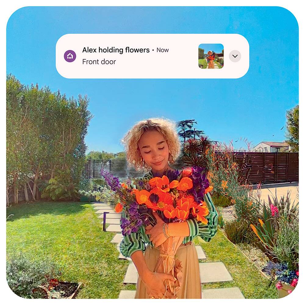 Alex holding flowers. Now. Front door.