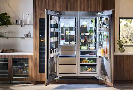 Kitchen with open refrigerator
