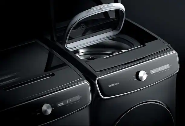 Front-loading washer with open lid on top showing additional washer