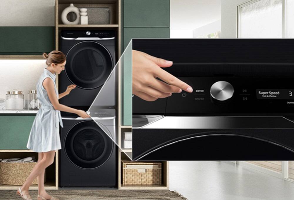 Person using controls on washer at waist height