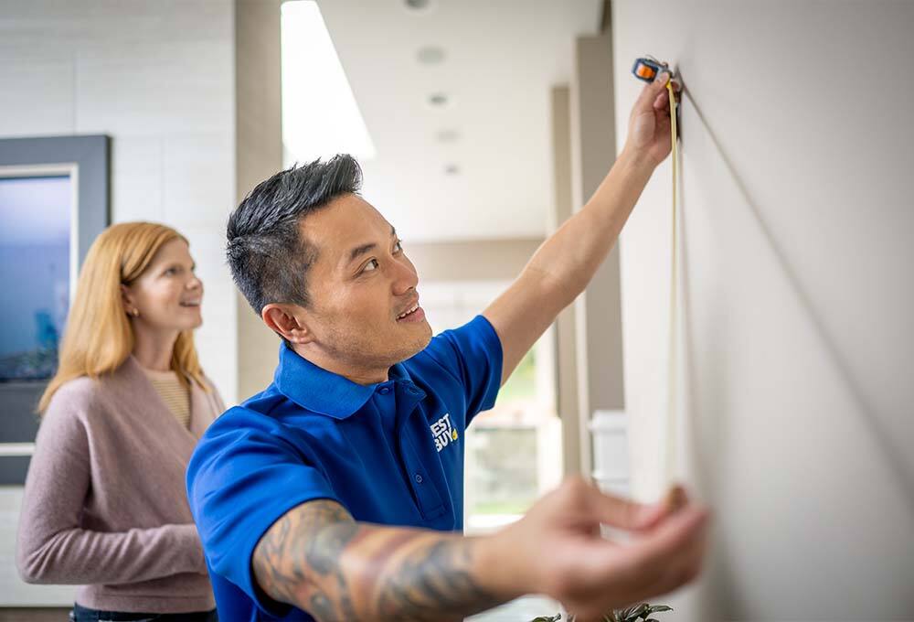 Best Buy in-home advisor with a customer