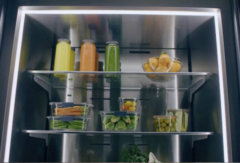 Refrigerator shelves surrounded by LED lights