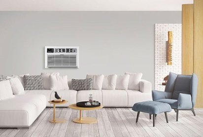 In-wall air conditioner mounted into living room wall