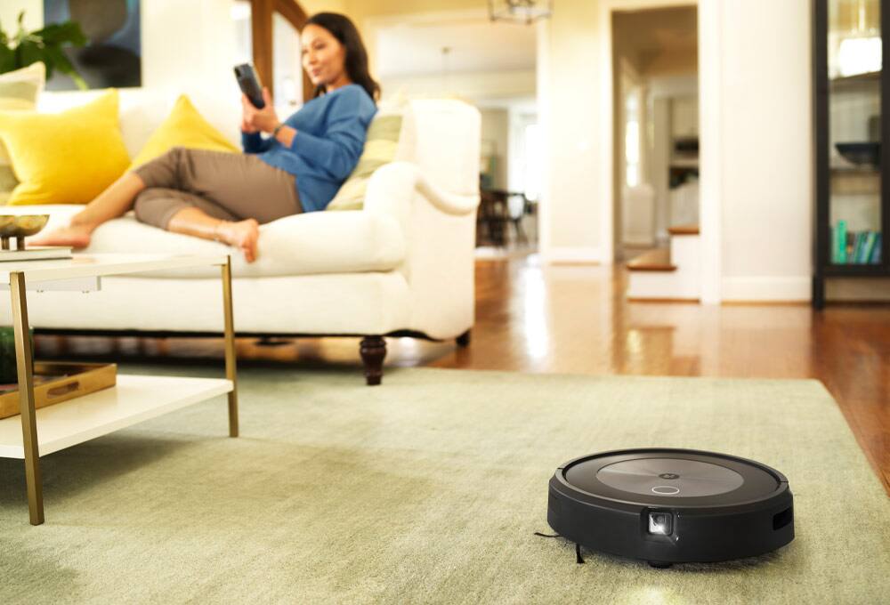 Robot vacuum on carpet in living room
