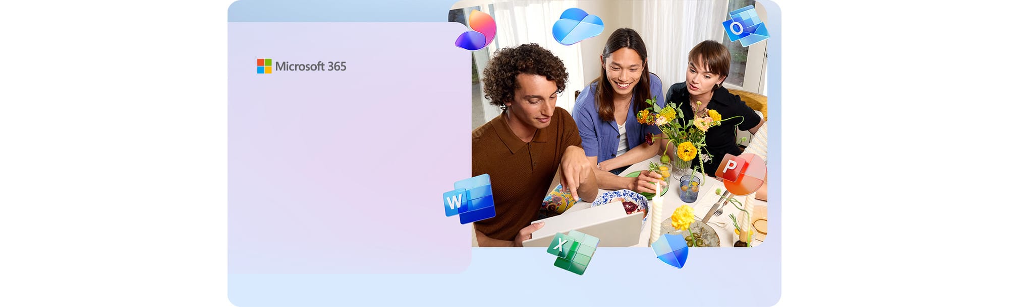 People at a table looking at a device