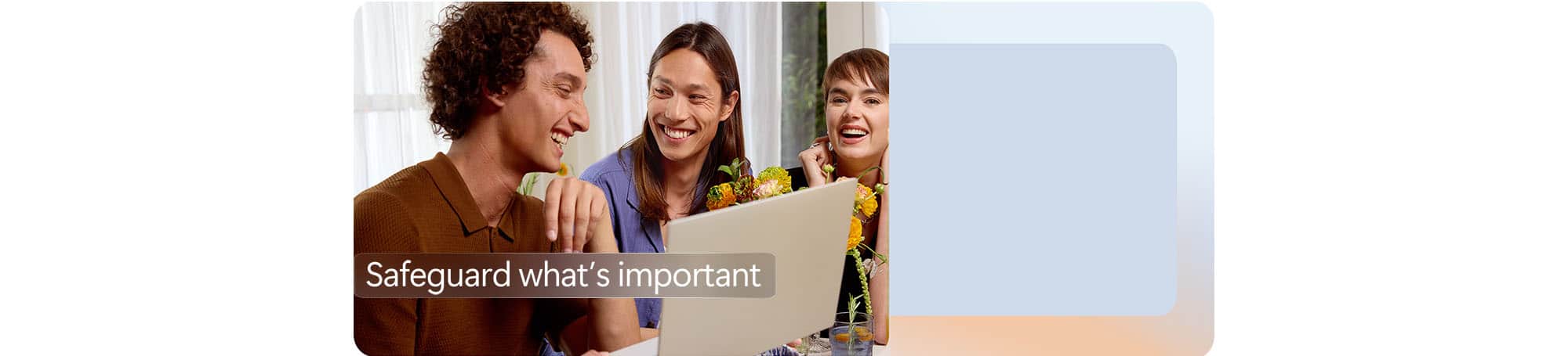 People looking at a laptop