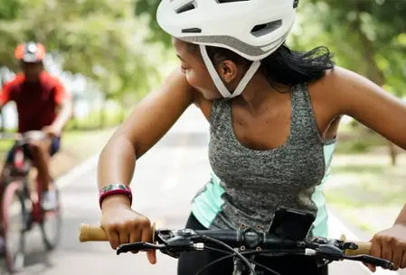 Woman and man riding bicycles