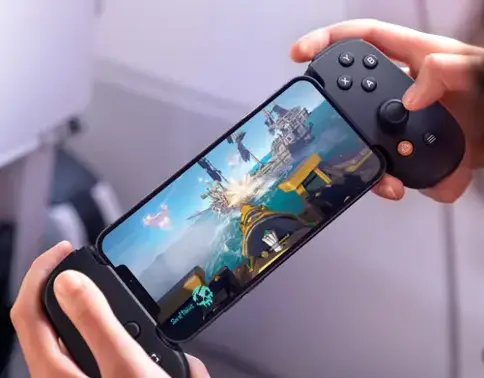 Man playing games on mobile phone