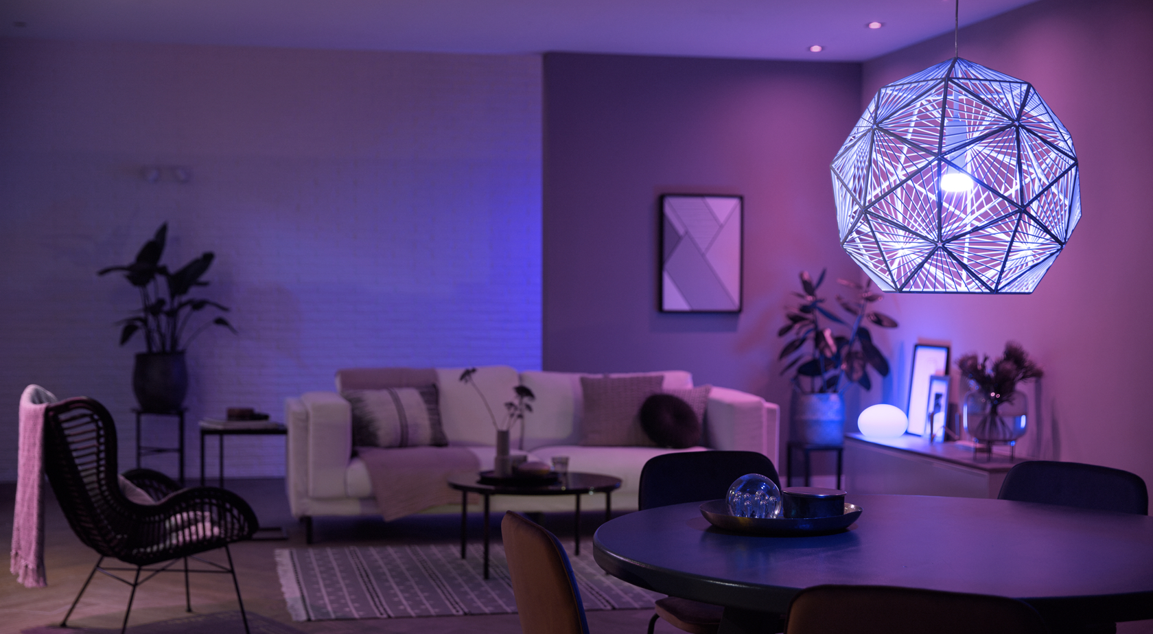 Living space with shades of blue and purple lighting