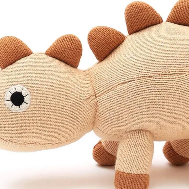 Left. Siljoy - Knitted Dinosaur Soft Toy, 35x13cm, Peach Powder, 100% Cotton & Polyester, Unique Spots & Spikes - Peach.