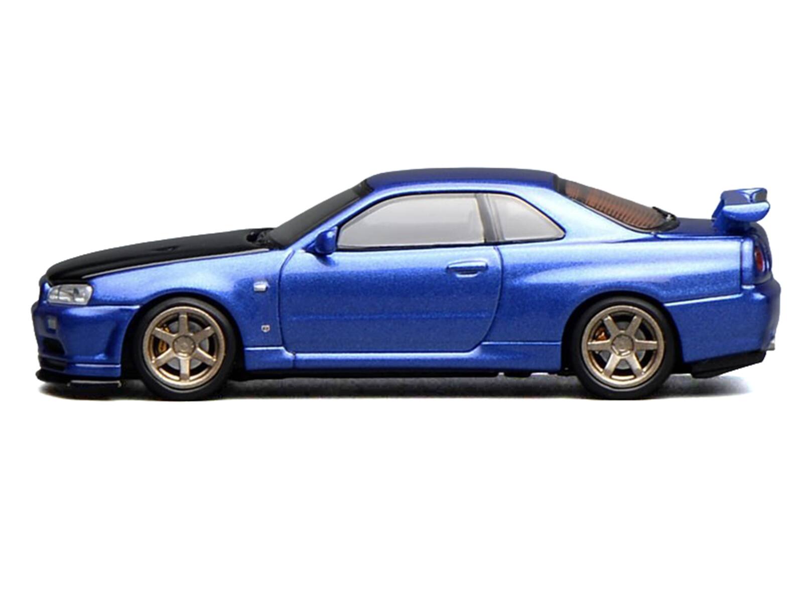 Alt View 2. MotorHelix - Nissan Skyline GT-R (R34) V-Spec II RHD Bayside Blue Metallic with Carbon Hood "Senior 64" 1/64 Model Car by MotorHelix.