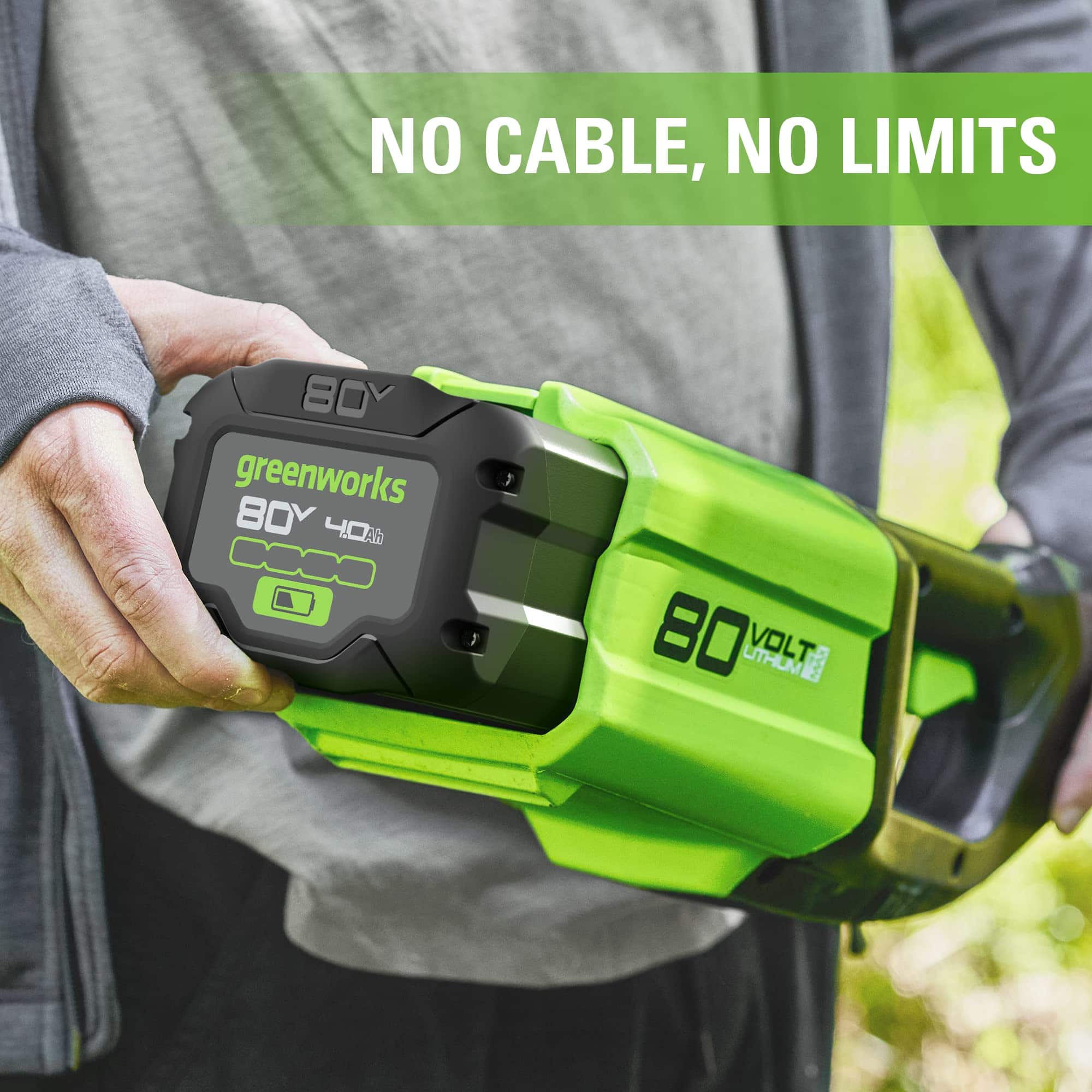 The text on the image is grouped and corrected as follows:
"No Cable, No Limits 80V Greenworks 80V 80Ah Battery - 000 80V 80Ah Battery."