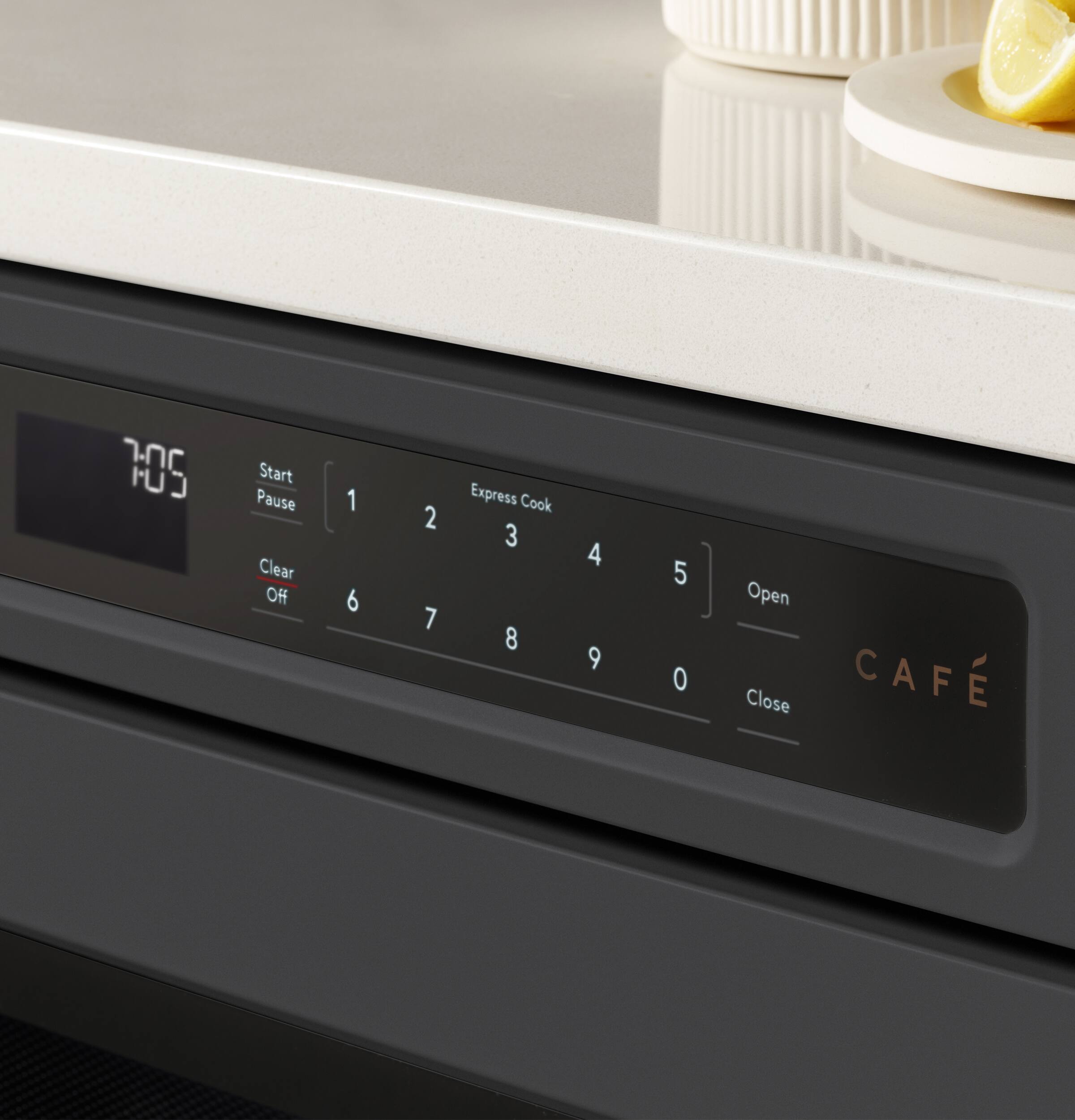 7:05 Start Pause Clear Off I 1 2 3 Express Cook 4 5 6 7 8 9 0 Open Close CAFÉ