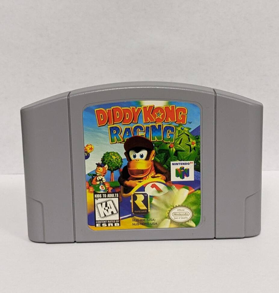 DIDDY KONG TM" RACING 5 KIDS TO ADULTS T KA R PArE CONTENT RATED BY NUS-006 (USA) ESRB 2 NUS-NDYE-USA d4 NINTENDO NN Offfcial Nintendo Soeal a Quality - E (Everyone)