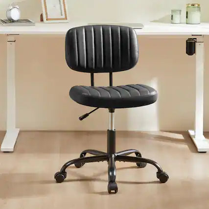 Front. Dazzed Corner - Armless PU Leather Office Chair with Wheels, Small Swivel Desk Chair with Lumbar Support - Black.