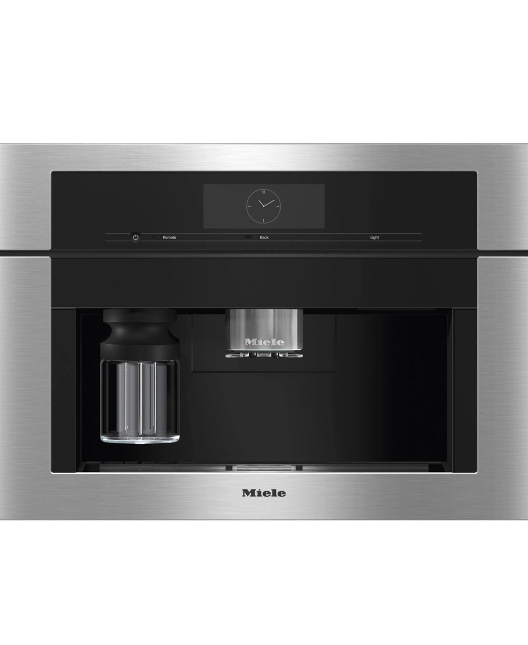Miele is a brand of appliances, including ovens, that are known for their high quality and modern design. The image shows a Miele oven with a stainless steel finish and a black door. The oven is equipped with a timer and a clock, which allows users to set the cooking time and keep track of the time remaining. The oven is also designed with a microwave, providing a convenient and versatile cooking solution for various dishes.