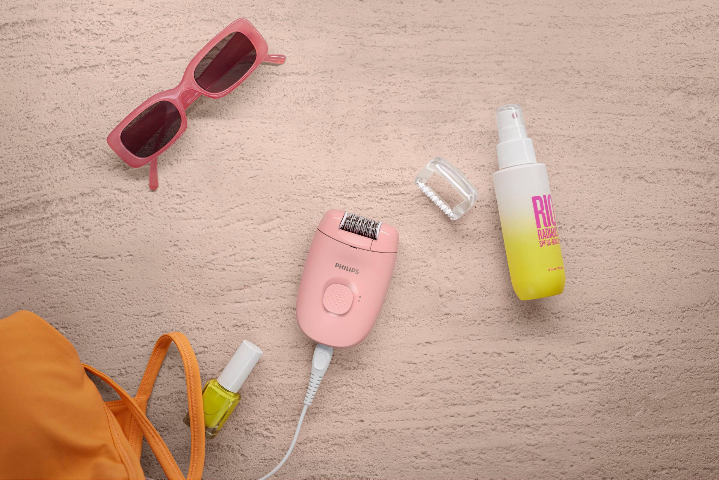 The text on the image reads "RIC Radian SPF 0-01, Philips 10m T - Charger, and a pink hair dryer."
