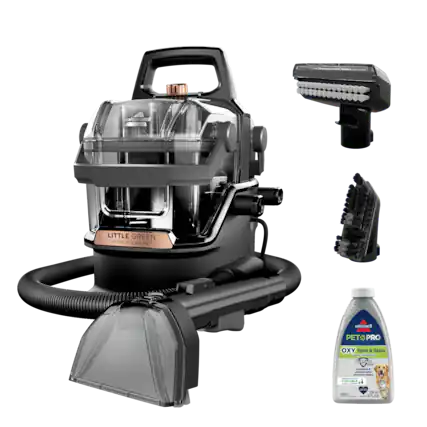 The image features a black and silver Little Green HydroSteam Pet Pro Oxy Spot & Stain Remover. The product is designed to remove spots and stains from various surfaces, such as carpets, upholstery, and clothing. The image also shows a bottle of the product, which is likely the cleaner used for the spot and stain removal. The product is advertised as an effective and convenient solution for cleaning and maintaining the appearance of different surfaces.