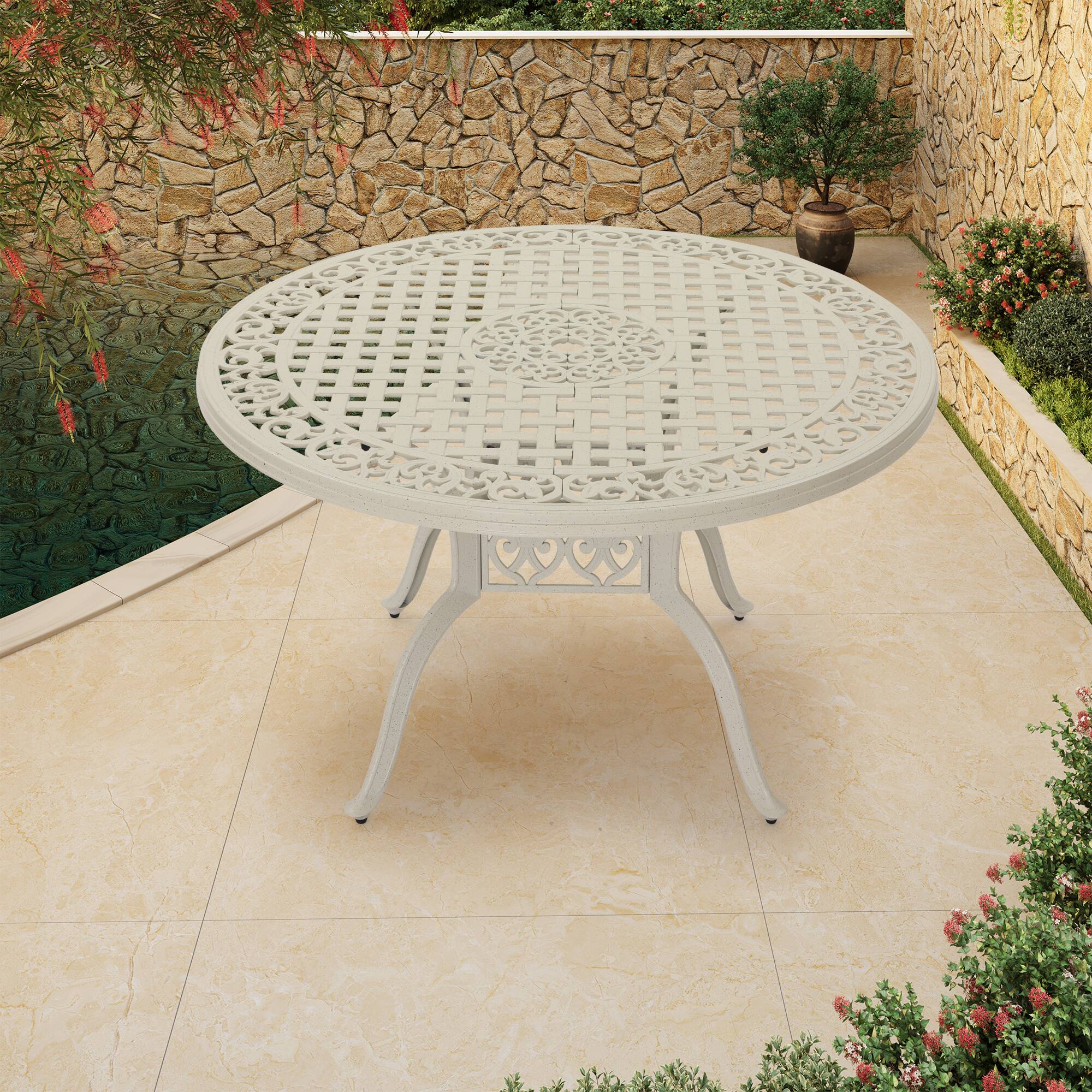 Left. Mondawe - 47" cast aluminum round dining table - White.