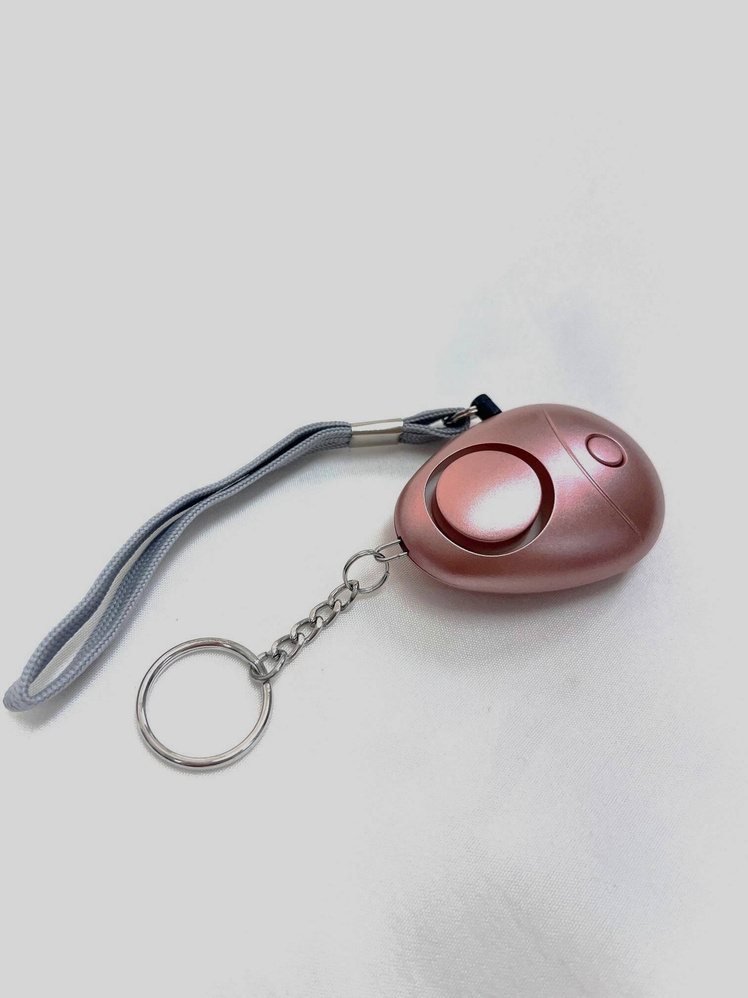 Left. SkyBluePD - Rose Gold Breck Personal Safety Alarm - Rose Gold.