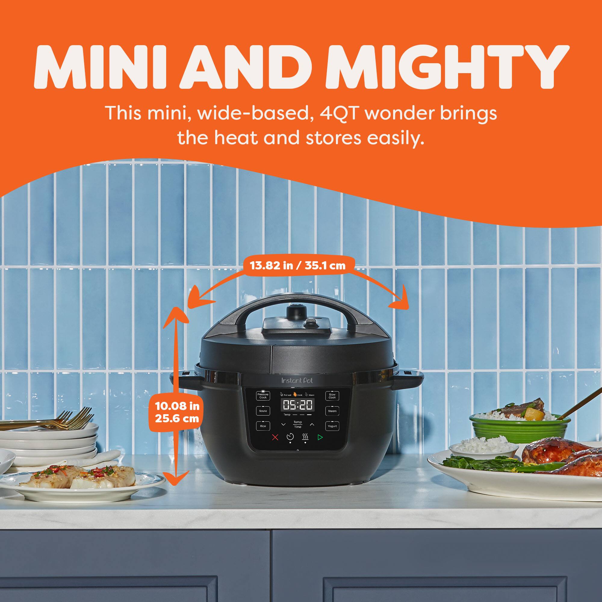 MINI AND MIGHTY  
This mini, wide-based, 4QT wonder brings the heat and stores easily.  

13.82 in / 35.1 cm  
10.08 in / 25.6 cm