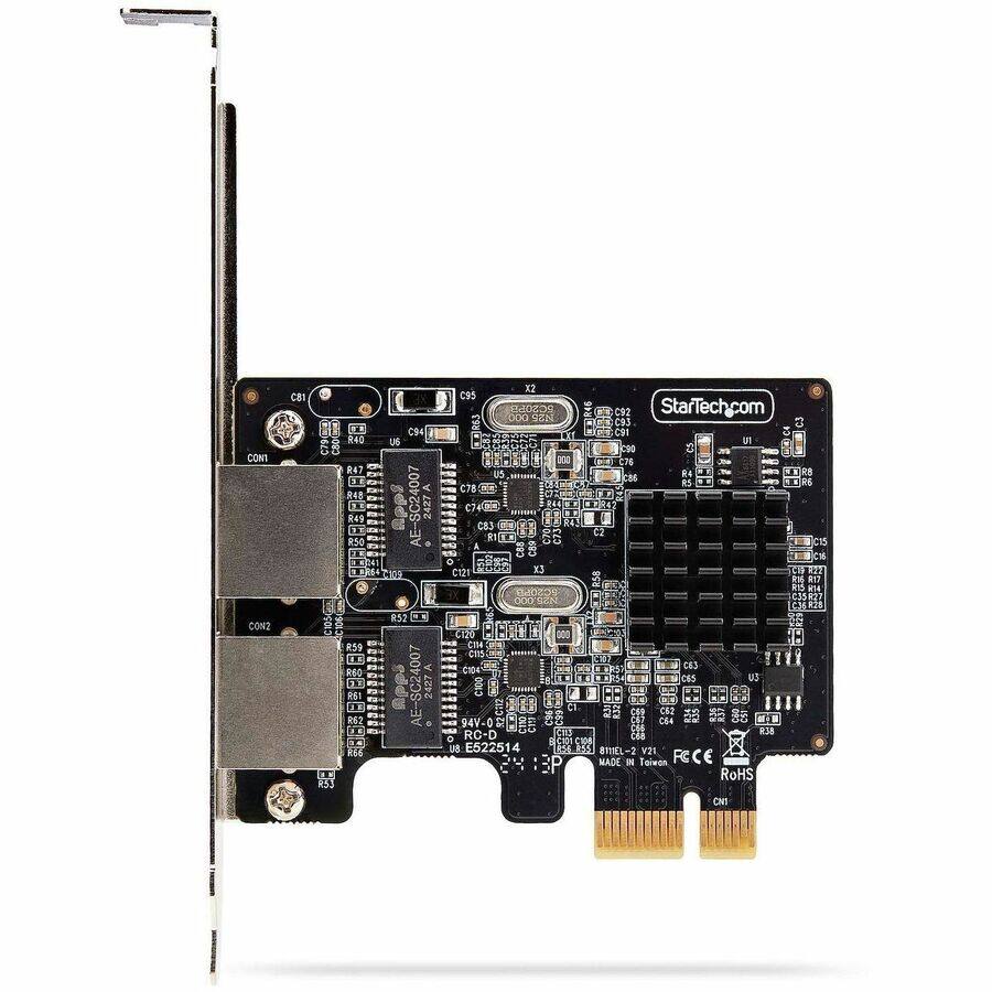 CON1  
C81  
cso  
R40 R47 R48 R49 R50  
C94 au SC24007  
X2 C95 5C20PB 000 N25 US C78 C83 A C88 C89 2000 X3 C121 SC20PB 000  
C2  
C92 StarTechcom C93 C91 un C90 C5 C76 CBS C19 R16 R17 R15 RW C35R27  
CON2  
R53  
CJ R59 LE R60 " R61 1X R62 FE 34 R66  
R52  
C120 C114 94V-0 C111 RC-D E522514  
000  
C63- CSS US C62 C64 croc R38 C68 8111EL V21 MADE IN Taiwan FECE RoHS OVI  
88