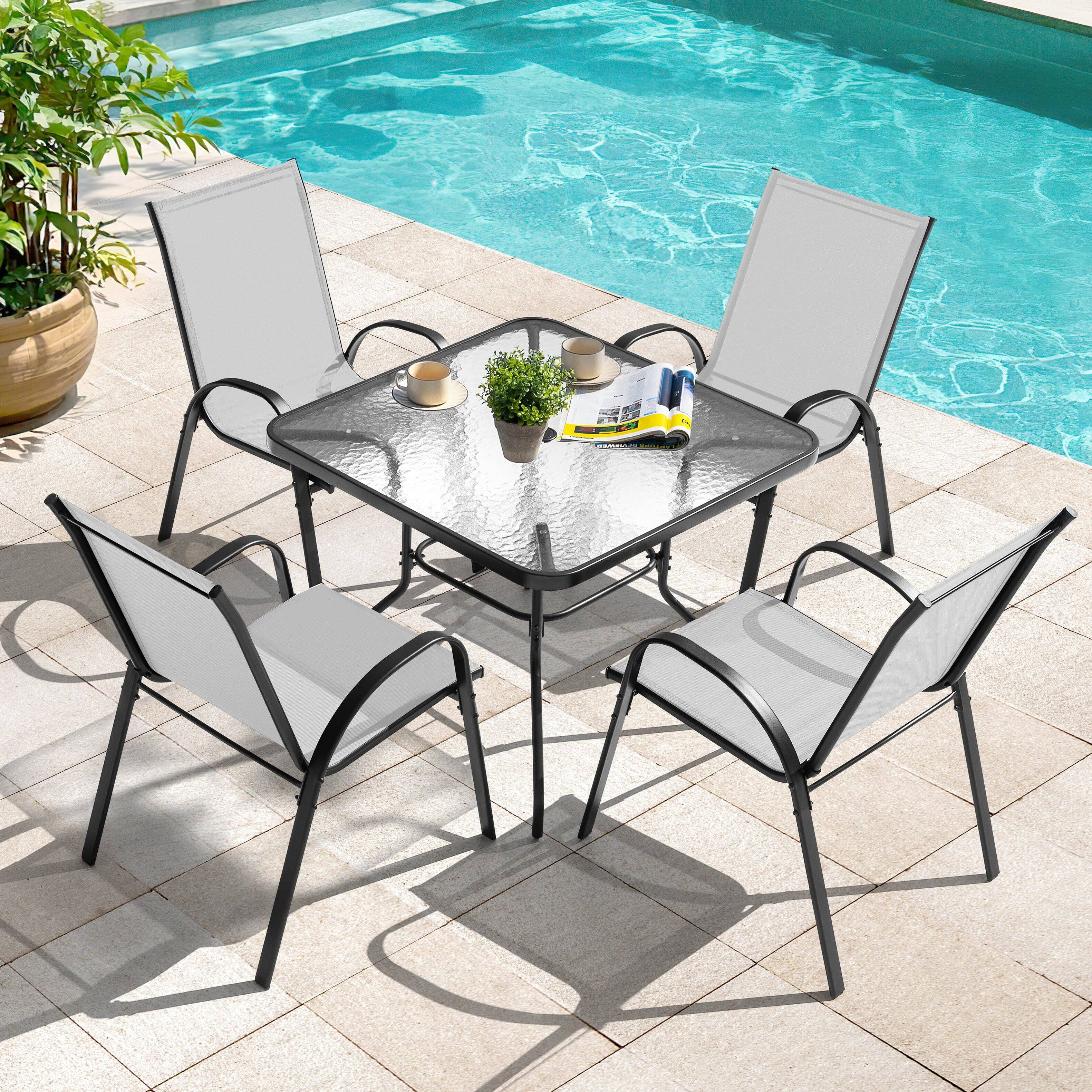Left. Nuu Garden - 5PCS Metal Outdoor Dining Set, 4 Stackable Chairs and Tempered Glass Table with Umbrella Hole - Gray and Black.