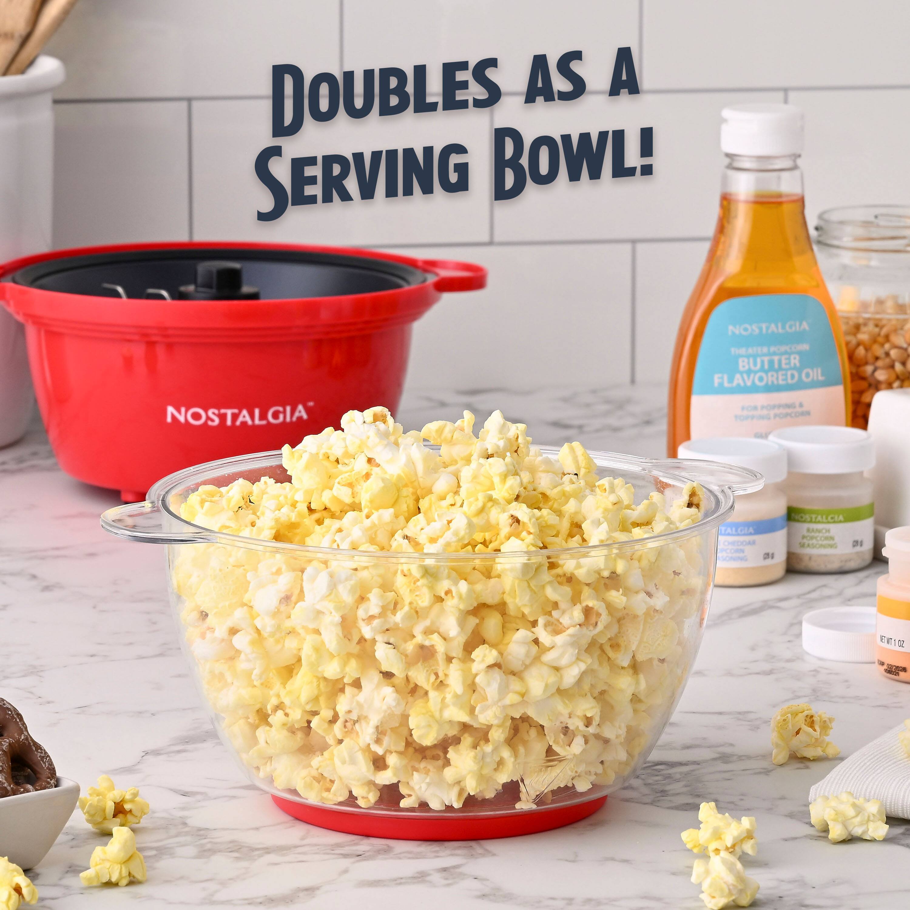 DOUBLES AS A SERVING BOWL!  
NOSTALGIA  
THEATER POPCORN  
BUTTER FLAVORED OIL  
FOR TOPPING POPCORN