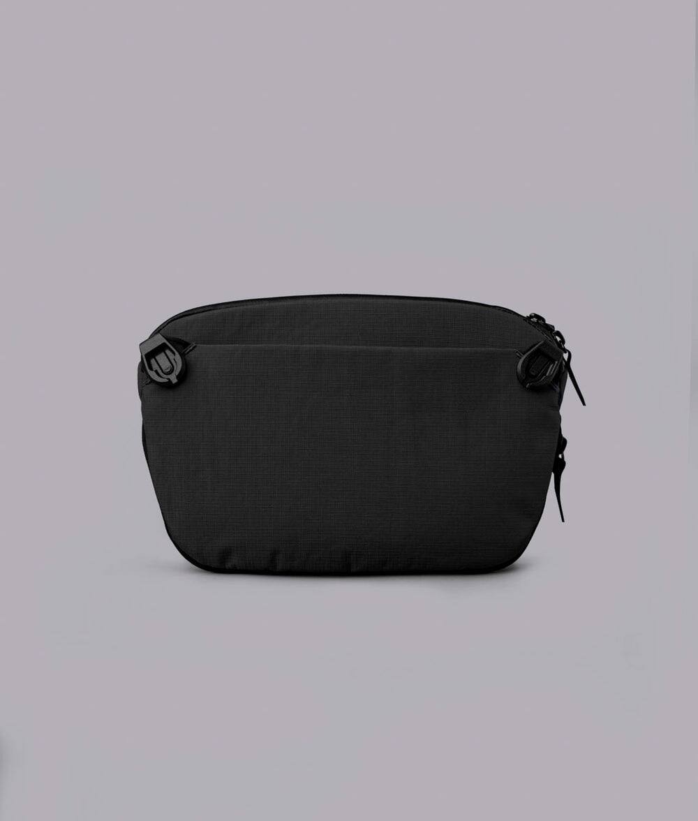 Back. ALPAKA - Flight Sling Pro 2.5L Sling Bag Crossbody Bag for Men, Bottle/Umbrella Sleeve, Fits 8.3" Tablet, YKK AquaGuard - Black Axoflux 400D Ripstop Nylon.