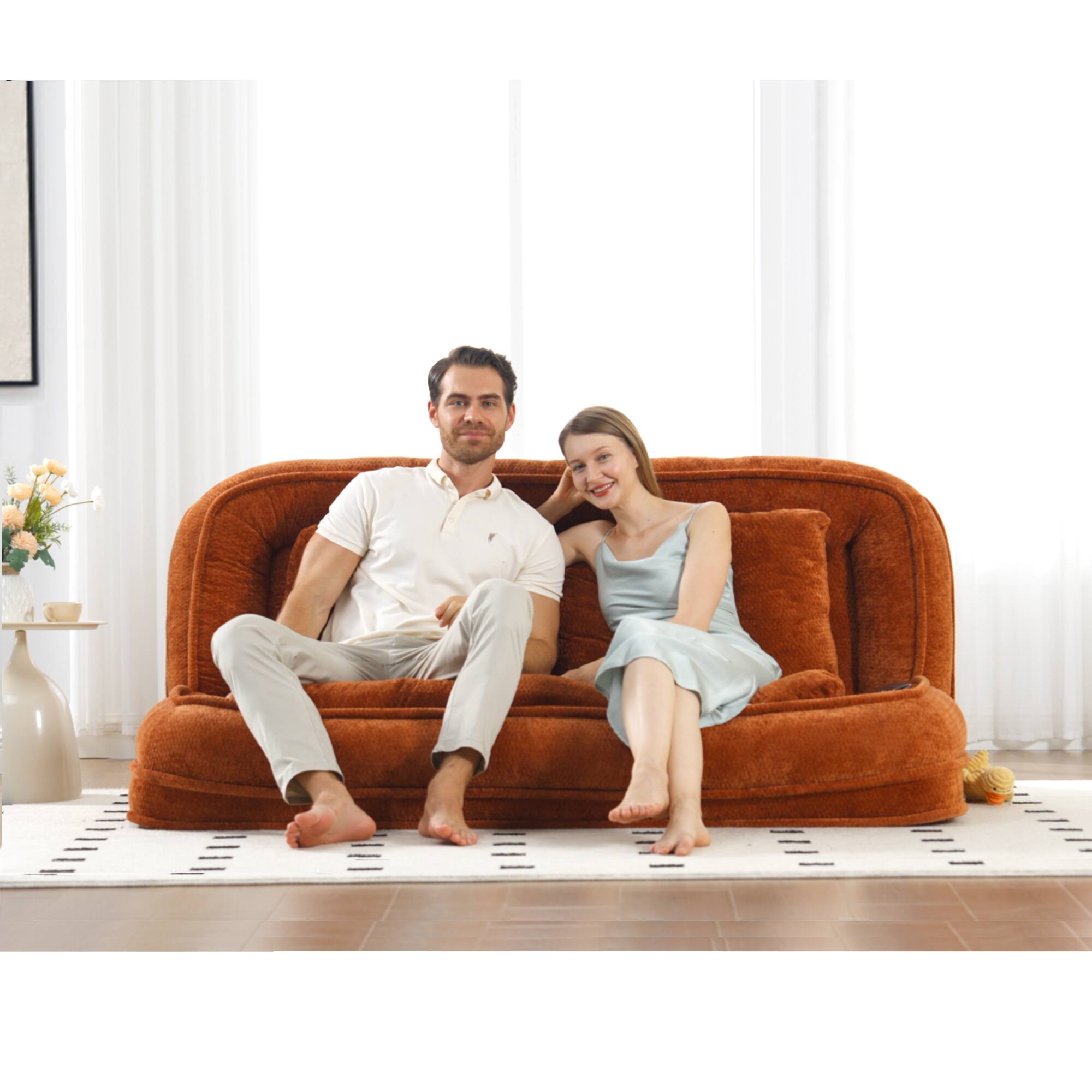 Angle. GOODSILO - Extra Large Convertible Floor Sofa Bed with Adjustable Backrest for Comfortable Lounging and Napping - Orange.