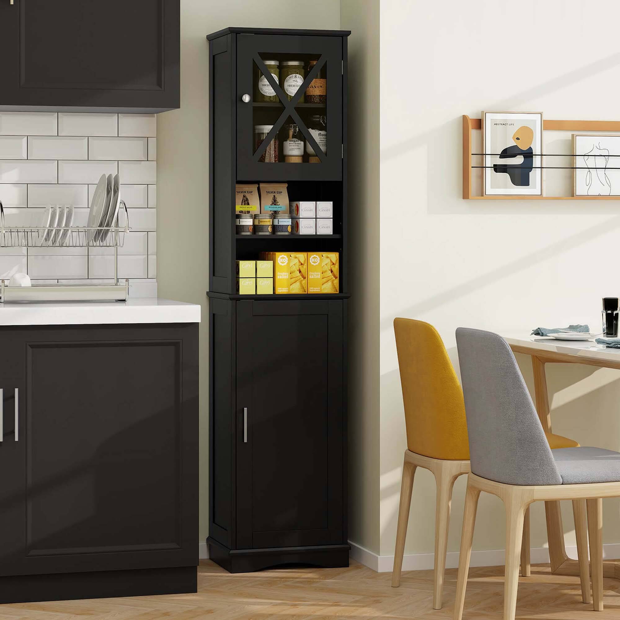 The kitchen is equipped with a black cabinet, a dining table, and a chair. The cabinet is filled with various items, including a collection of bottles, cups, and a bowl. The dining table is set with a fork, a knife, and a spoon. The chair is positioned near the table, ready for someone to sit and enjoy their meal.