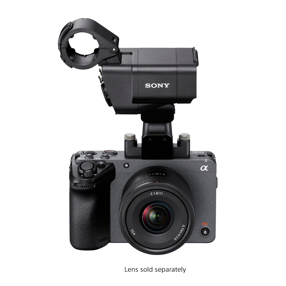 The image features a Sony camera with a lens attached to it. The lens is sold separately, and the camera has a 1.8/11 55mm focal length. The camera is positioned on a tripod, ready for use.