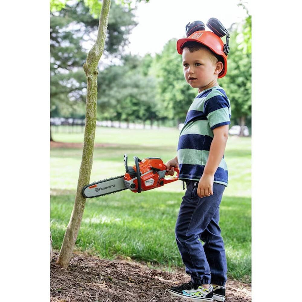 Left. Husqvarna - 550XP Toy Chainsaw and Personal Protection Equipment Kit.
