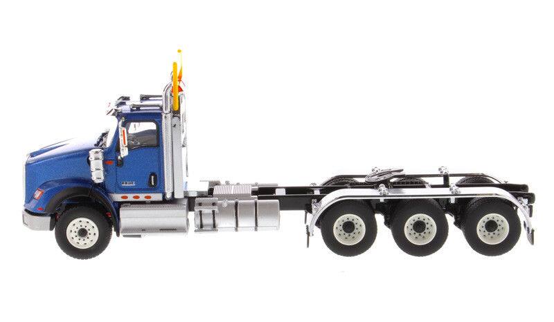 Alt View 2. Diecast Masters - International HX620 Day Cab Tridem Tractor Blue 1/50 Diecast Model by Diecast Masters.