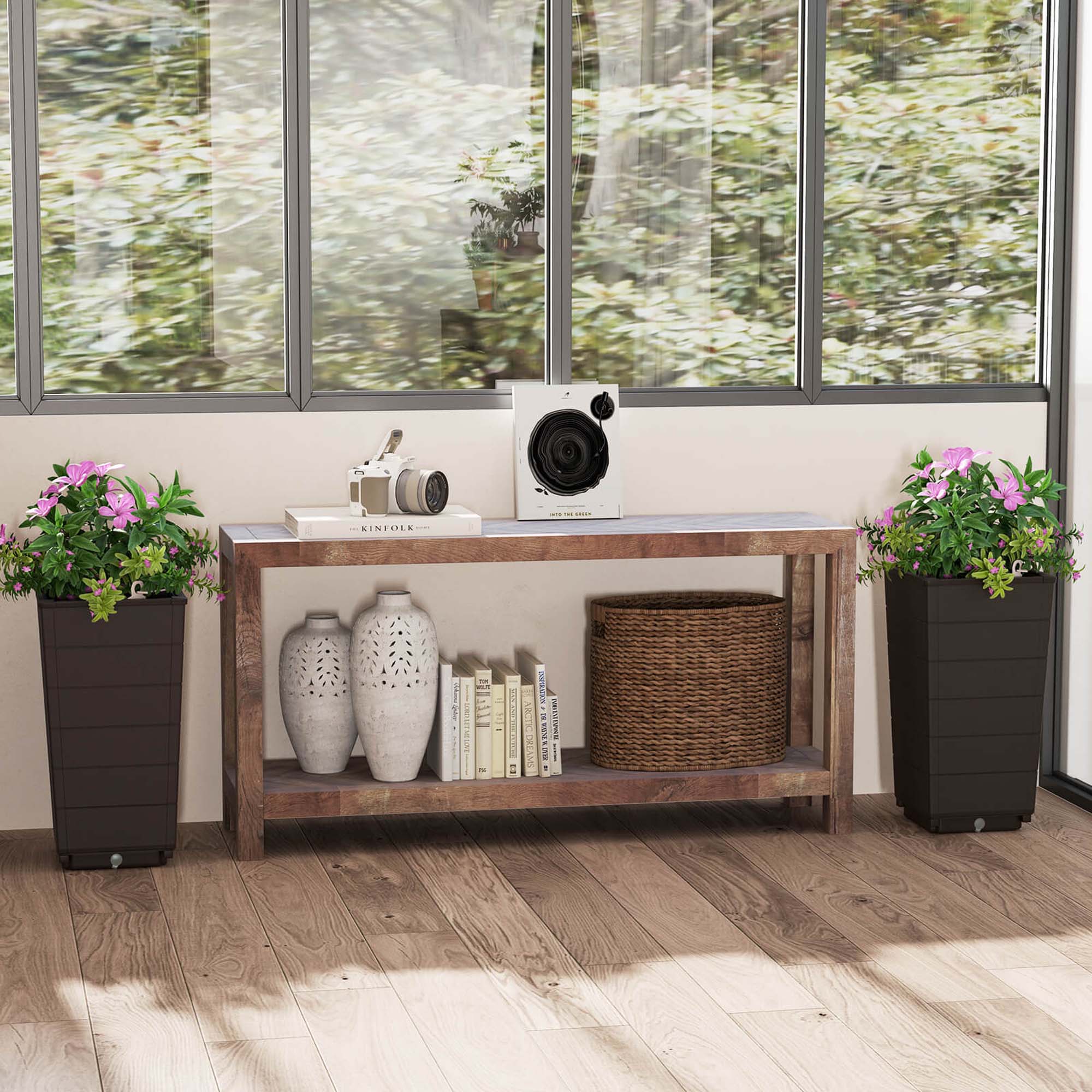 The image shows a wooden table with a speaker and a vase of flowers on it. There are also two potted plants, one on the left and one on the right side of the table. The table is located in front of a window, and there are books on the table as well. The scene appears to be a cozy and inviting space for relaxation and enjoyment.