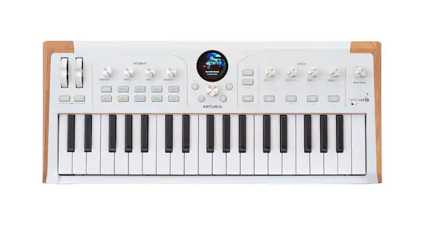 INSTRUMENT - EFFECTS
American tend - - kp
Brightness Volume Timbre Ravi Plane E.Puna Organ Time M BAS Movement 1 Treble Les -m dars sn Chare Scale AEI intensity 1E B/ Itety Delay 1 Cima Reverber Decay Master Klue Dct trans det Rers Fad Strings Basi See 1 +
ARTURIA Paria
Save as Lae Lae as ASTROLAB 37