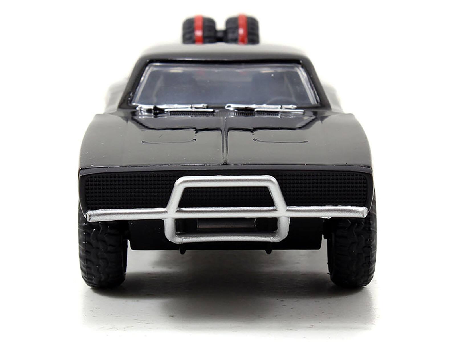 Left. Jada - Dom's 1970 Dodge Charger R/T Off Road Version "Fast & Furious 7" Movie 1/32 Diecast Car Model by Jada - Black.