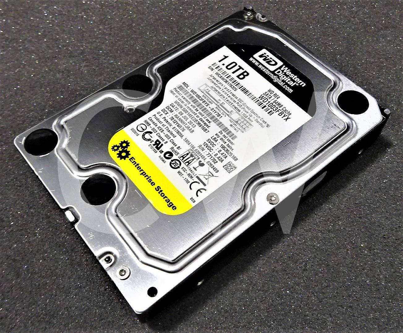 SIN BI 1.0TB  
www.westerndigital.com  
WD Western Digital  
Cover warranty  
WD1003FBYX  
SATA/64MB  
DCX  
DATE: 09  
U.S.  
DCX  
09  
500  
vold -01Y781  
Spectium Cache  
JUL  
SG0  
Lp  
I  
Canada  
Product Patents: 7012Y6R76  
14EE2836916B7  
2013  
damaged  
PHY  
Standby Cache  
af  
SuOccO  
0O3  
-S331  
Thailand  
6178056  
Classe  
083  
ay los  
8  
Class  
595619  
5VDC  
LBA  
drive cover  
E101580  
ROHS  
B/  
195  
R/N:  
12VDC  
:0  
1953525  
hales.  
S9GEN  
ATA  
BERIAL  
6289484  
771702  
0