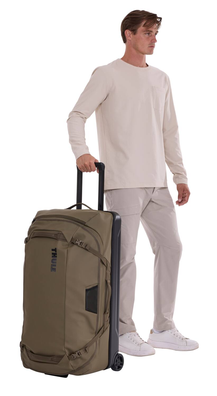 Left. Thule - Chasm Wheeled Duffel Bag – Rugged 70L Rolling Travel Gear - Deep Khaki.