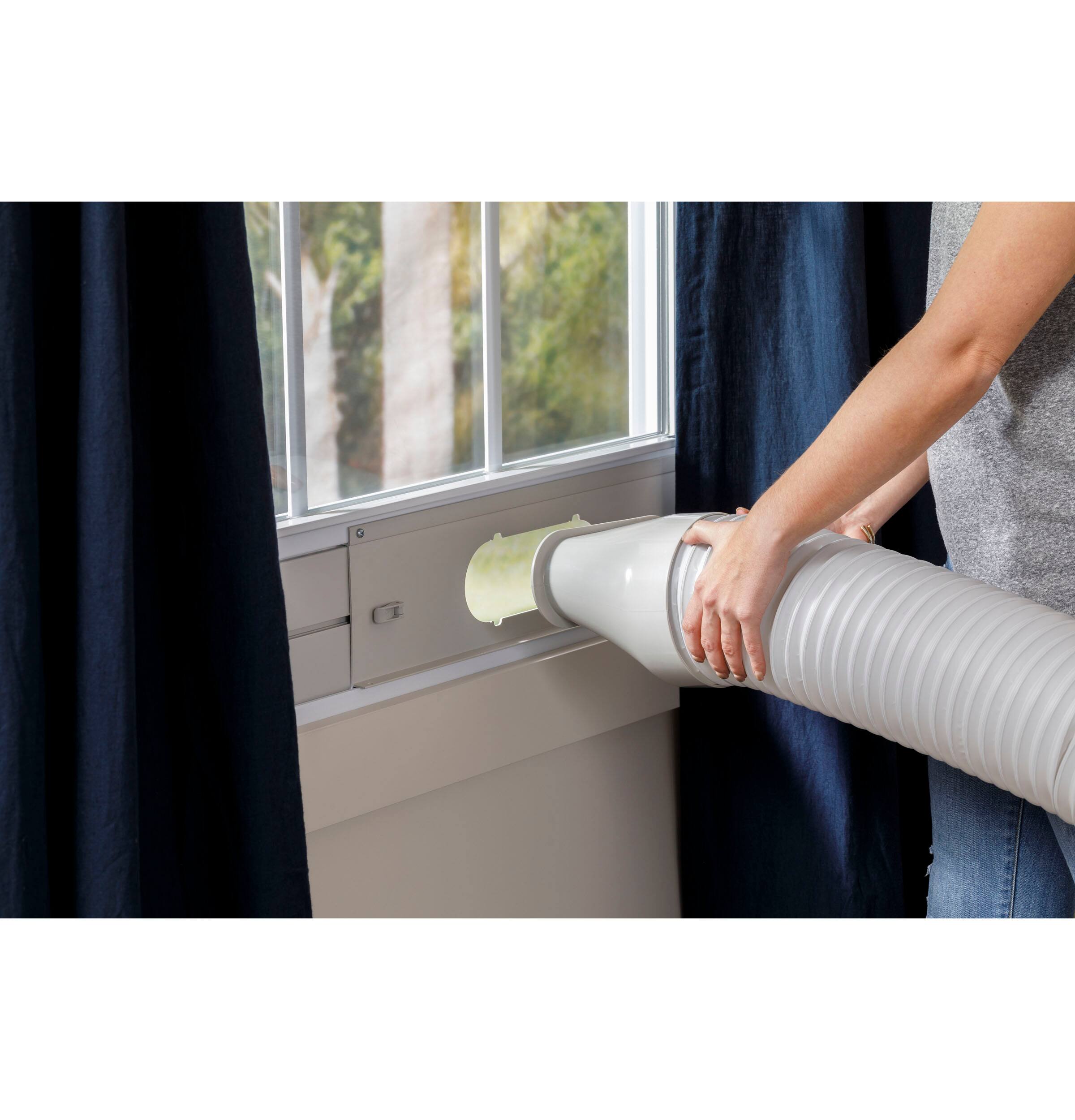 Alt View 14. GE - 250 Sq. Ft. 6,000 BTU Portable Air Conditioner with Auto Evaporation Technology - White.